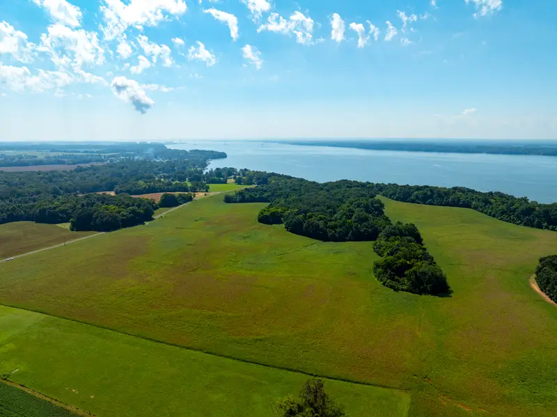 Wide pasture sloping toward Lake Wheeler
